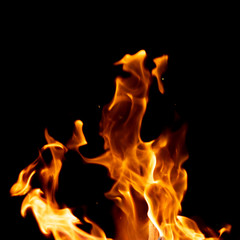 strong fire flames on black isolated background