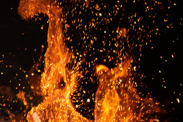 Fototapeta na wymiar strong fire flames on black isolated background