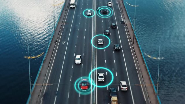 Aerial view autopilot cars driving on bridge highway with speed and identity technology scan system. Careful self driving with innovative traffic surveillance control technology. 4K dolly zoom visual
