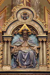Fototapeta na wymiar God the Father, statue on the main altar of the Visitation of Mary in the church of the Saint Peter in Ivanic Grad, Croatia
