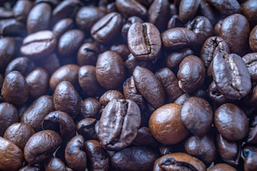 Coffee Beans Background. Close Up fresh roasted brown