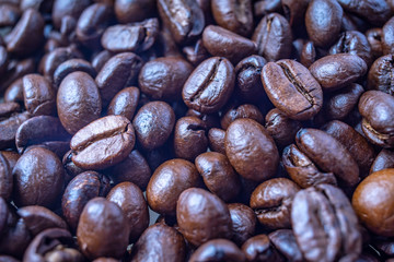 Coffee Beans Background. Close Up fresh roasted brown