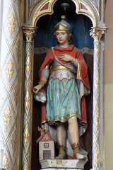 Saint Florian, statue on the altar of the Sacred Heart of Jesus in the church of the Saint Maximilian in Posavski Bregi, Croatia - obrazy, fototapety, plakaty