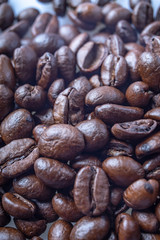 Coffee Beans Background. Close Up fresh roasted brown