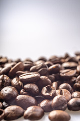 Coffee Beans Background. Close Up fresh roasted brown