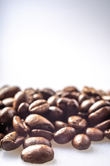 Coffee Beans Background. Close Up fresh roasted brown