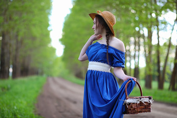 Girl in the countryside in the evening