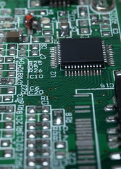 Green circuit board representative of the high tech industry and computer science