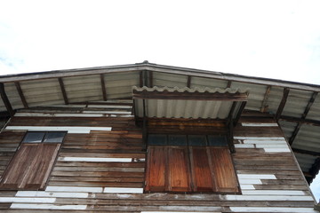 Residential wooden houses and the sky backdrop in Thailand