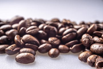 Coffee Beans Background. Close Up fresh roasted brown