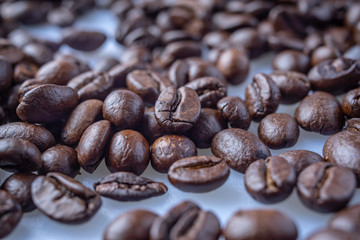 Coffee Beans Background. Close Up fresh roasted brown