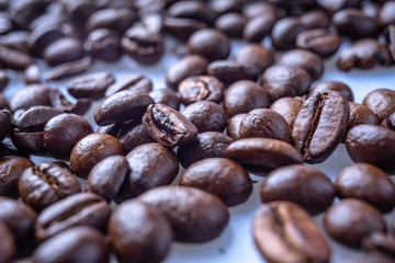 Coffee Beans Background. Close Up fresh roasted brown