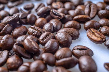 Coffee Beans Background. Close Up fresh roasted brown