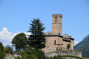 Fototapeta na wymiar The castle of Sarre among the green of the mountains in Aosta Valley - Italy