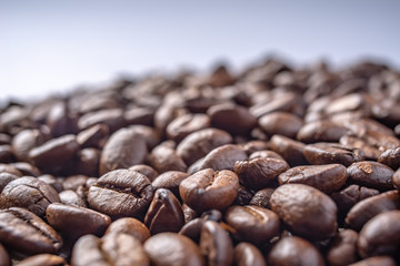 Coffee Beans Background. Close Up fresh roasted brown