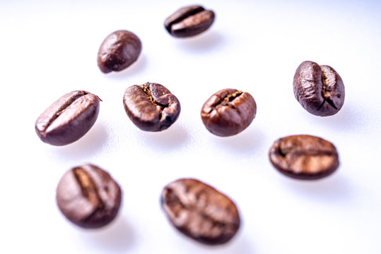Coffee Beans Background. Close Up fresh roasted brown © Liran