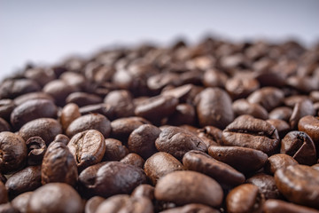 Coffee Beans Background. Close Up fresh roasted brown