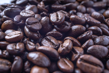 Coffee Beans Background. Close Up fresh roasted brown