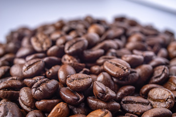 Coffee Beans Background. Close Up fresh roasted brown