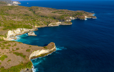 Naklejka premium Drone Shot of Blue Lagoon Penida at Nusa Penida, Bali - Indonesia