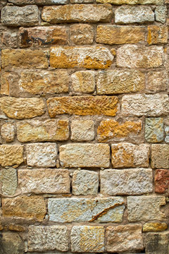 old weathered sandstone wall