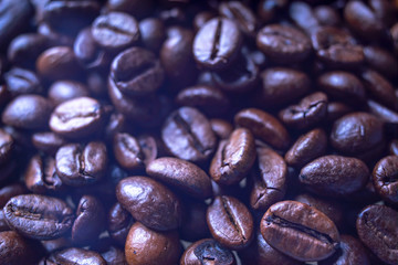 Coffee Beans Background. Close Up fresh roasted brown