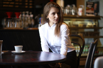 The girl in the cafe breakfast