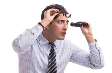 Young handsome businessman looking into future with binoculars