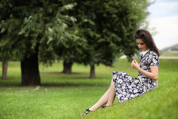 Beautiful girl in dresses for a walk