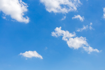 Naklejka na ściany i meble White clouds with blue sky background.