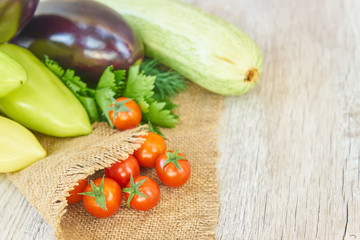 Organic vegetables on wood. Selective focus. Healthy food background, with copy space
