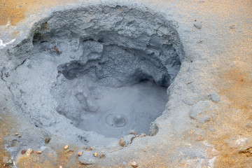 Hverir Namafjall colorful geothermal place in Iceland. Fumaroles volcanic boiling mud pots,...