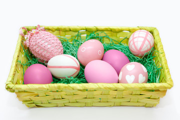 Colorful easter eggs in a basket