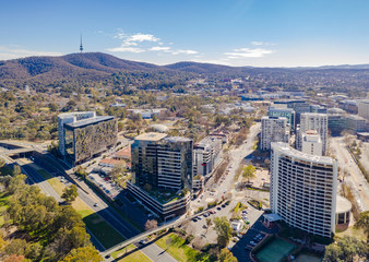 Aerial view of Canberra City looking north with the Ovolo Nishi building at left, NewActon South Building and BreakFree Capital Tower over Parkes Way - obrazy, fototapety, plakaty