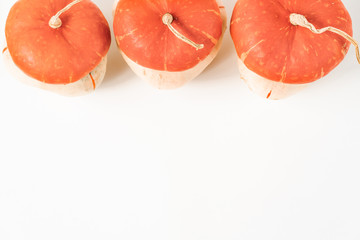 Pumpkins on white background fall autumn concept.