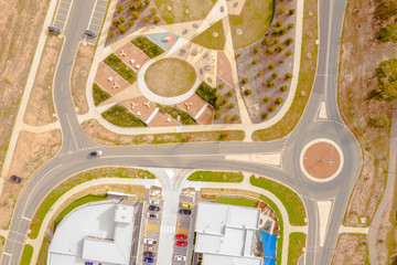 Aerial view of small blocks, streets and roundabouts in the newly established suburb of Coombs in Canberra, Australia