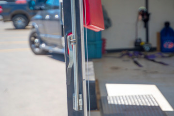 open trailer with truck in parking lot