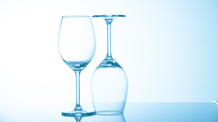 Glasses with water on blue background