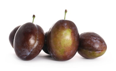 Fresh plums isolated on white background