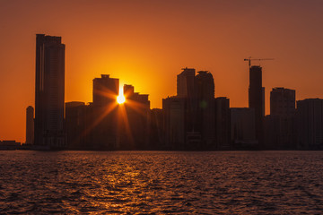 Fototapeta na wymiar Sharjah skyline at sunset, UAE