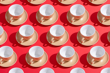 Collage set pattern coffee cup mug with saucer on red background