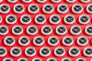 compass collage pattern set on red background