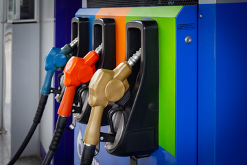 Gas station. Fuel dispenser and car ready to be filled up at petrol pump station.