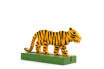 Vintage Tiger Toy Animal Wooden On White Background © squeebcreative
