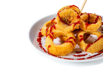 Onion rings with sauce on white background 
