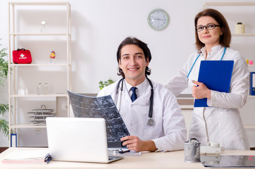Two doctors working in the clinic