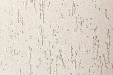 Texture of rough concrete gray wall with irregularities,close-up