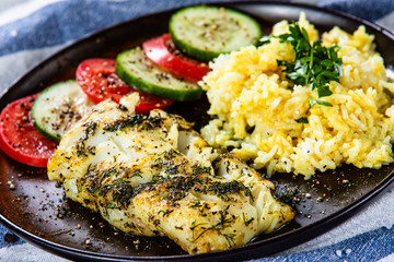 Fish dish - fried cod fillet and vegetables