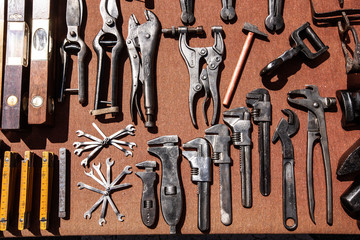 Vintage joinery tools on a red background