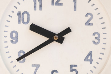 Full frame of dial office wall clock in a classic style